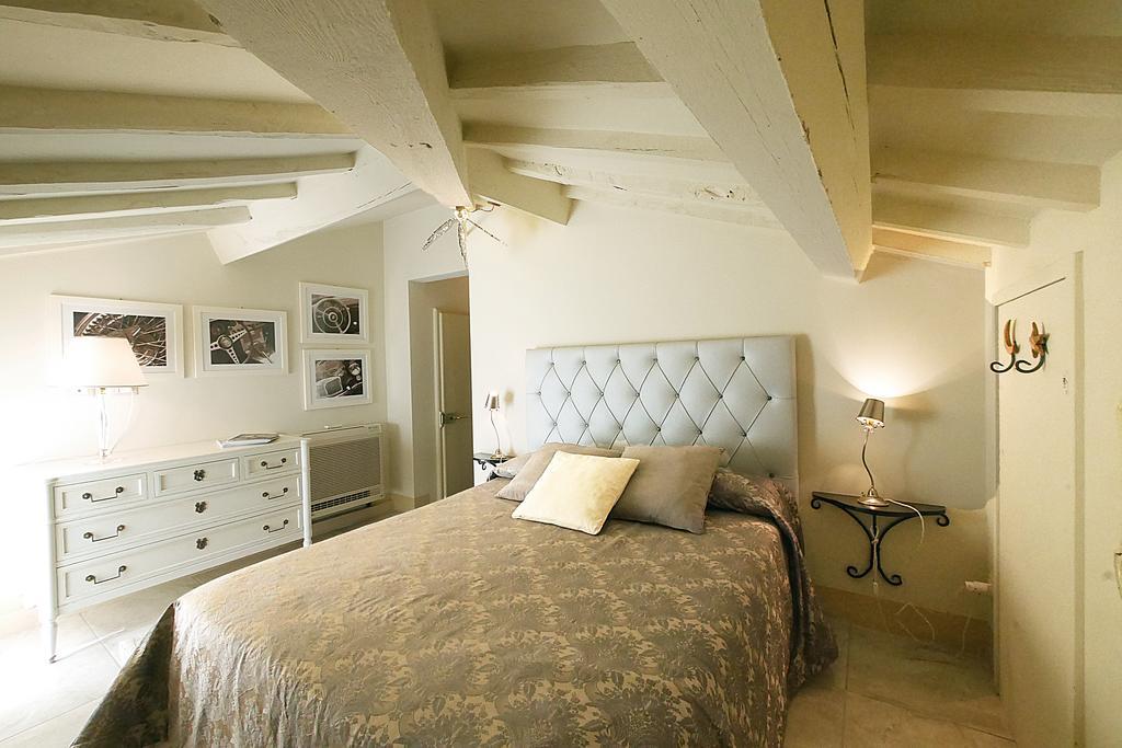 Villa Le Luci กัสตาลเญโต การ์ดุชชี ห้อง รูปภาพ